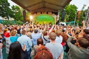 Vladimir Shahrin and Chaif rock-band perform on stage in Hermitage Garden